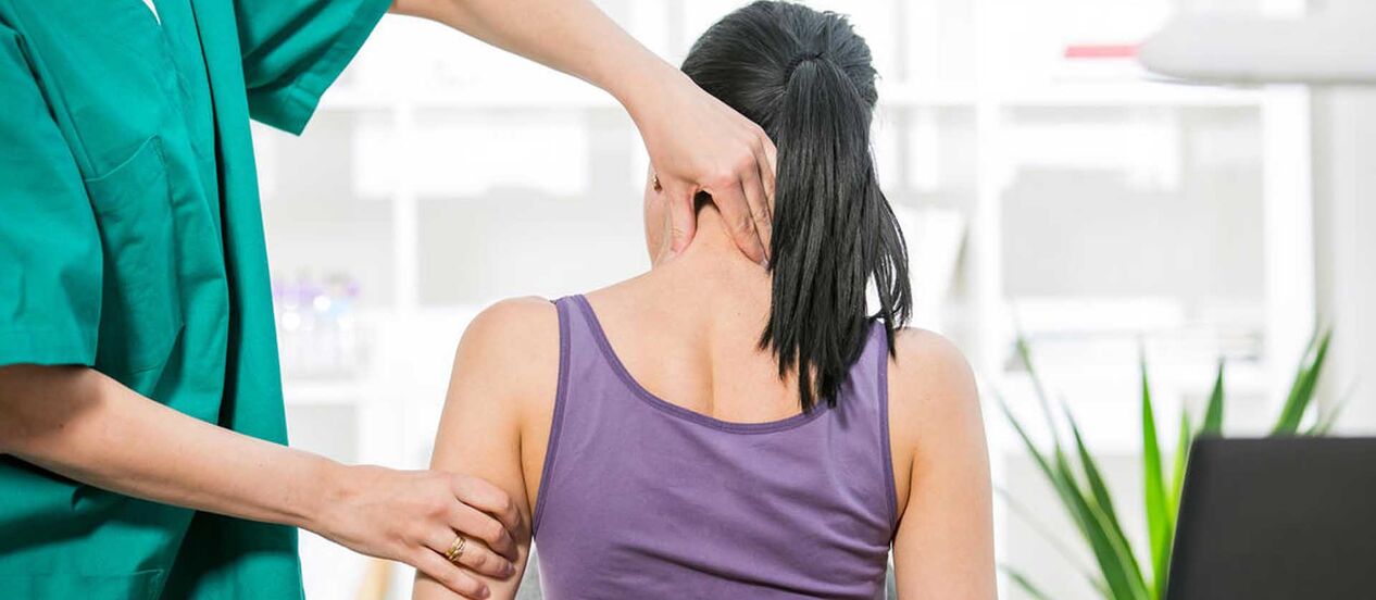 A patient with neck pain is being examined by a doctor